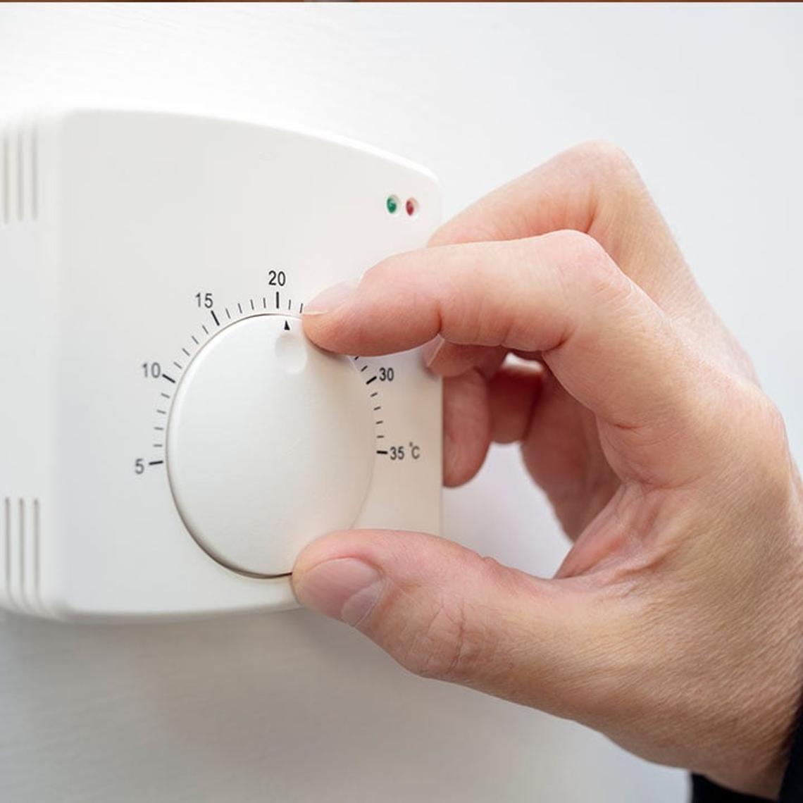 turning heating thermostat down