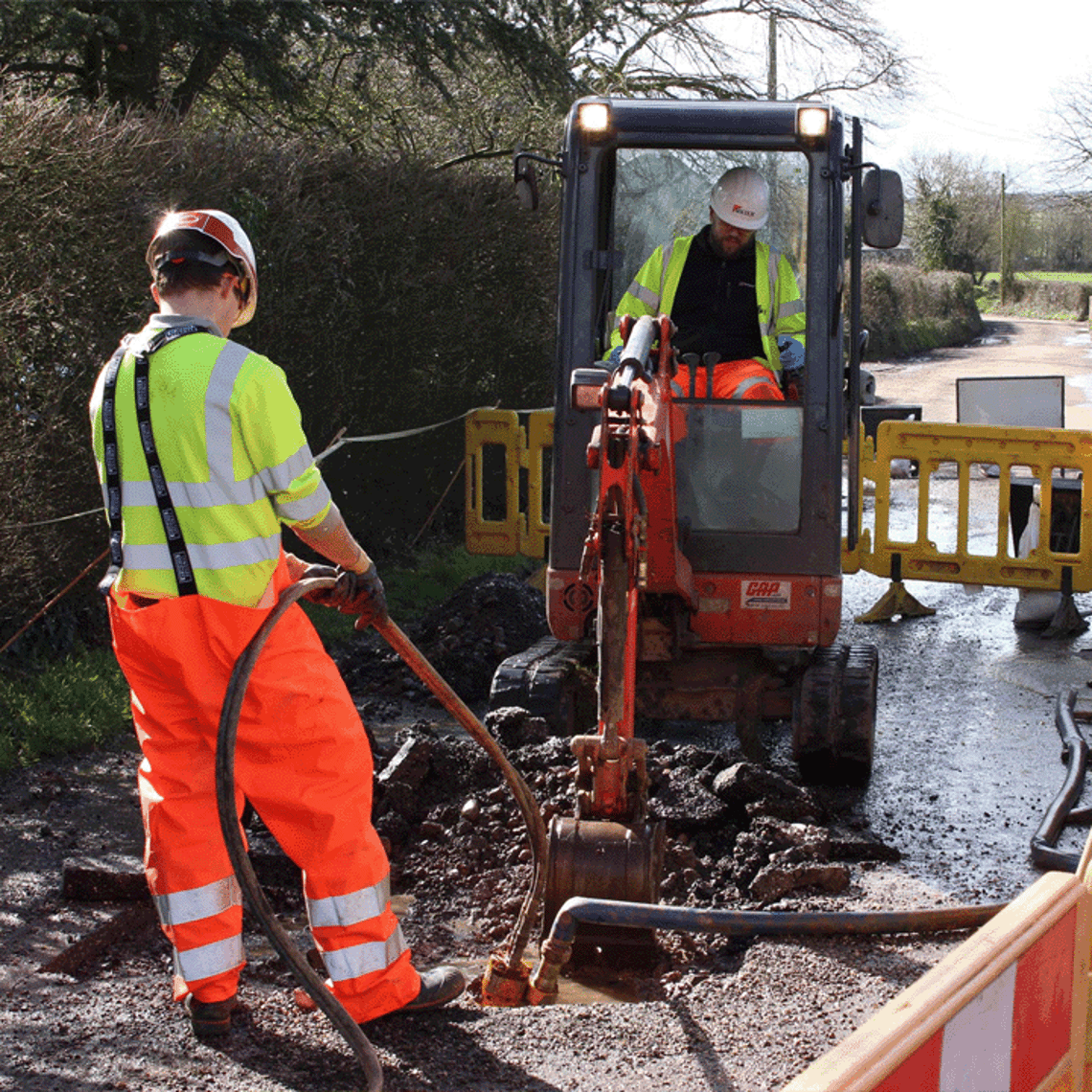 Working making repairs in the road