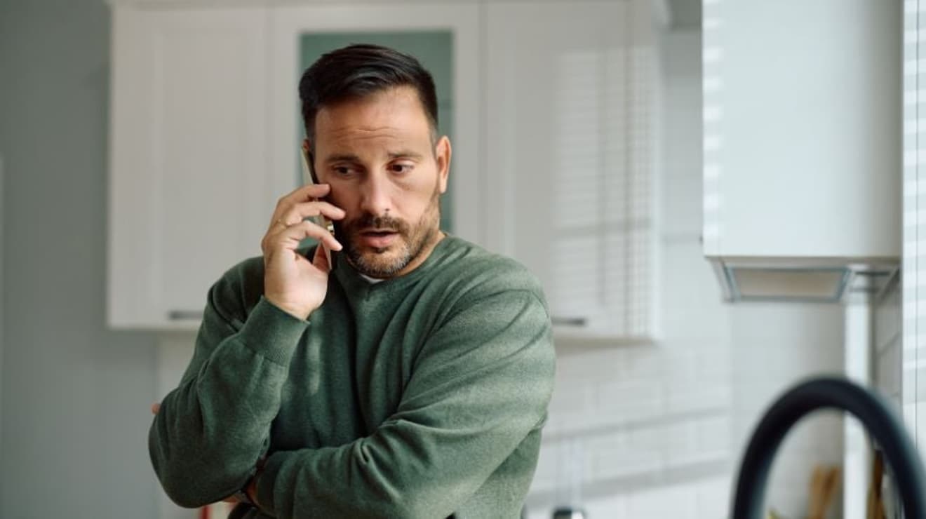 Man making a complaint on the phone