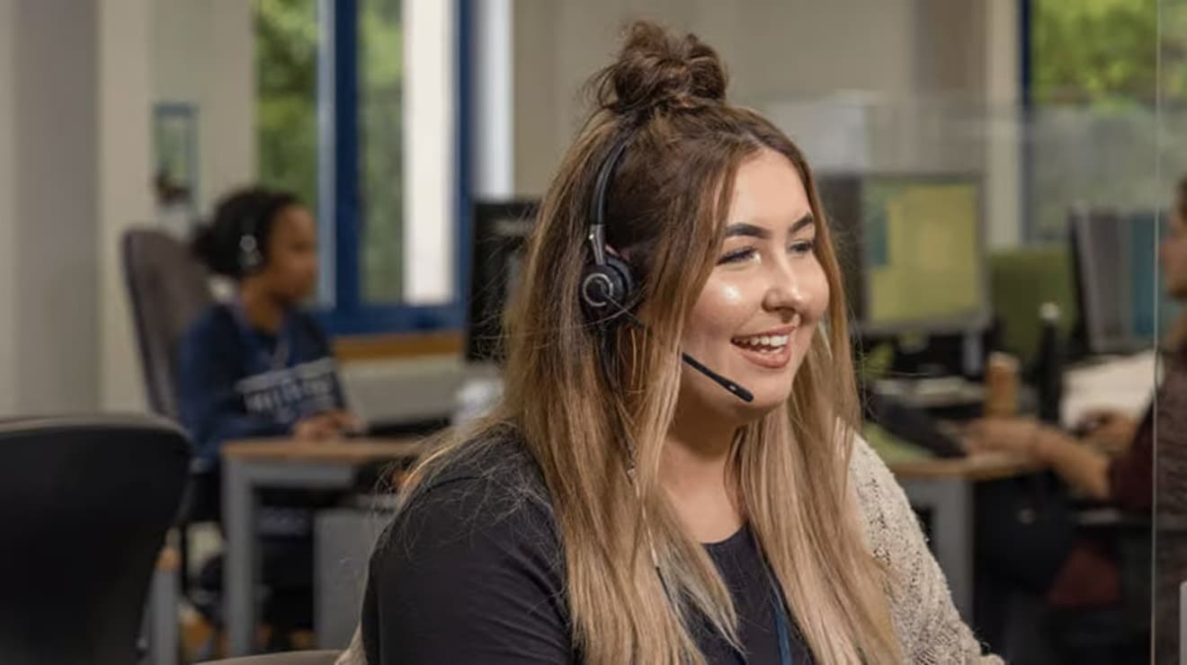 Smiling customer services woman