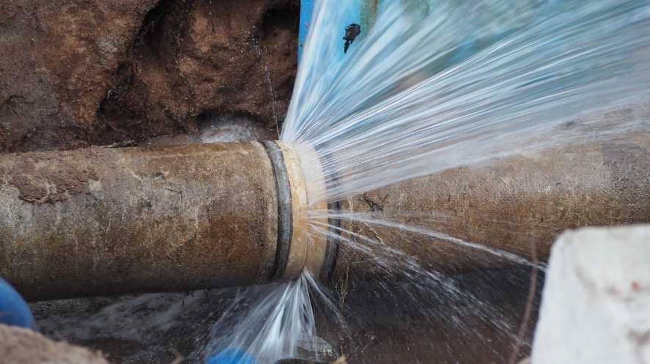 leaking water main pipe