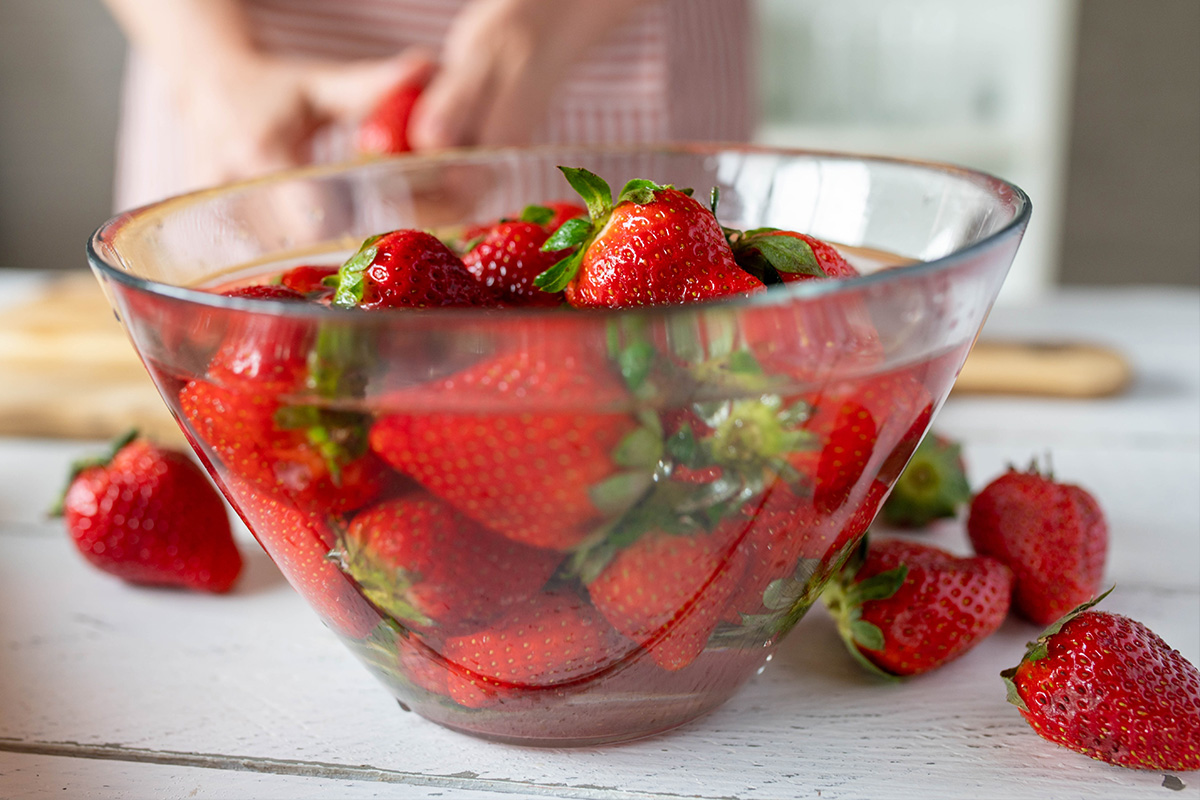 Strawberries in a bowl of water