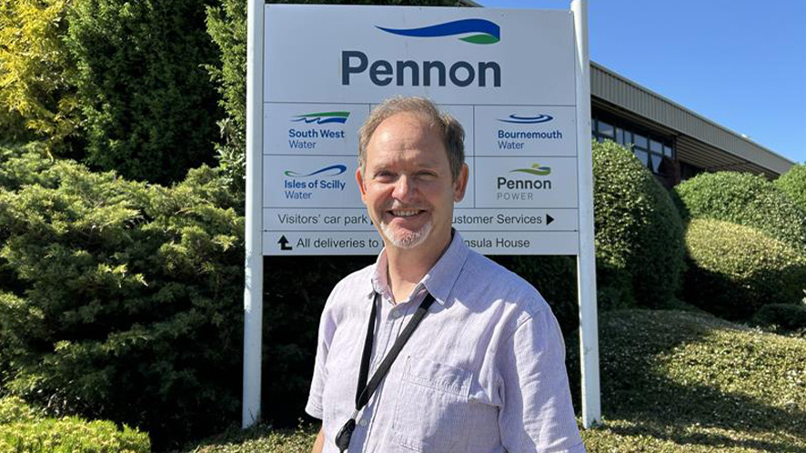 Image of Andrew Pennington smiling outside the Pennon offices