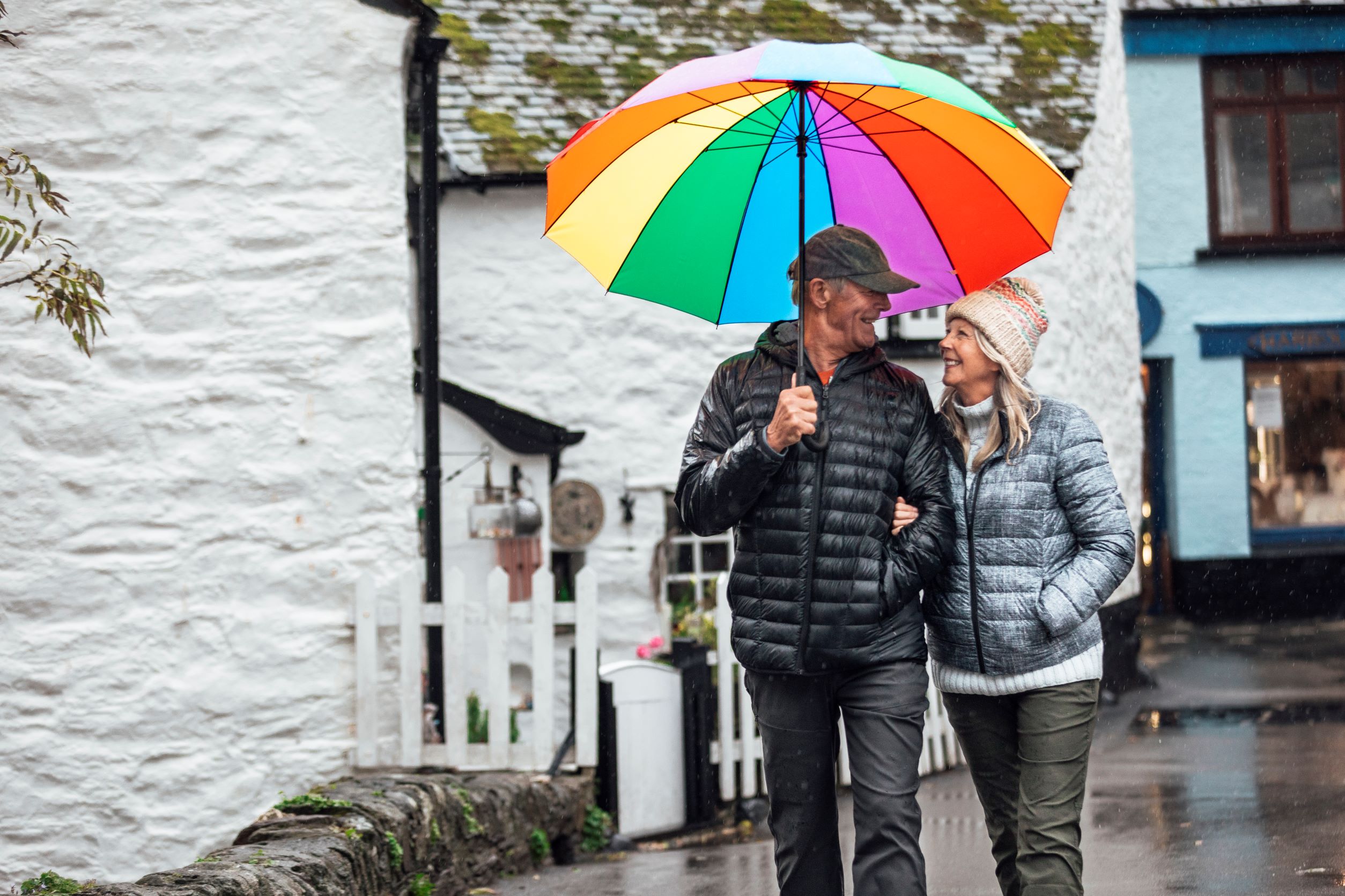 an image ofd two people with an umbrella