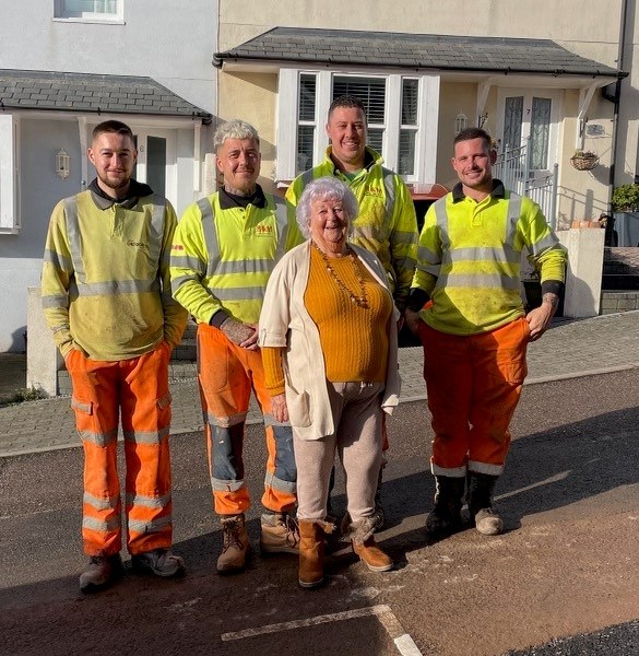 photo of the technicians with a local 