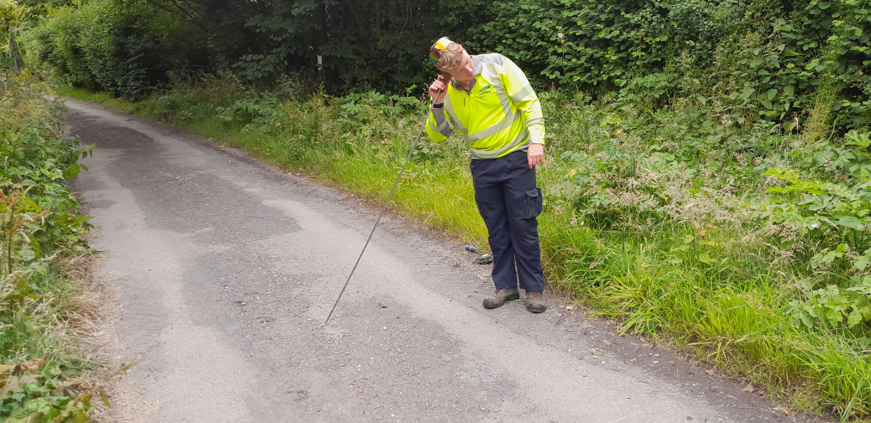 an image of matt using his listening stick