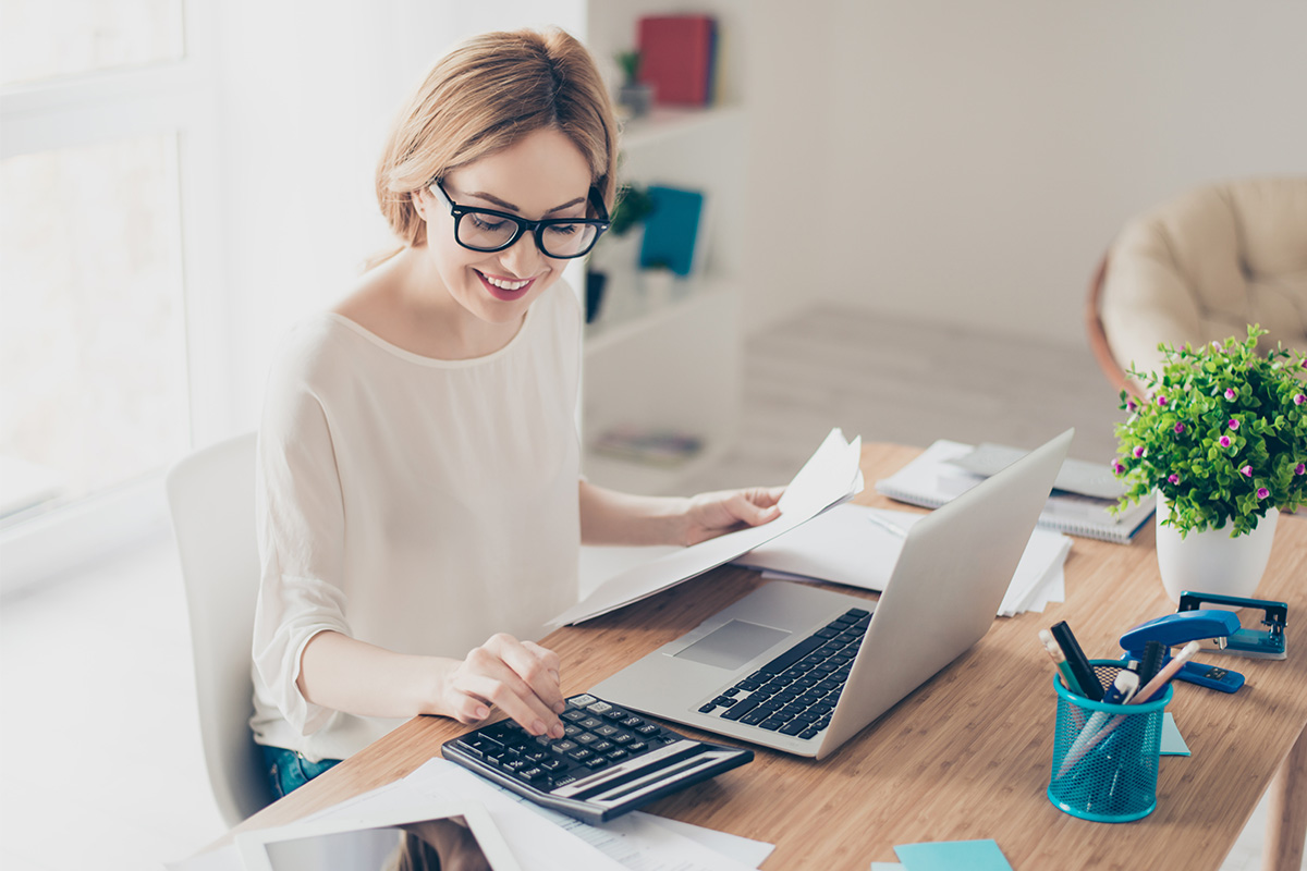 woman_doing_calculating_laptop_promo.jpg